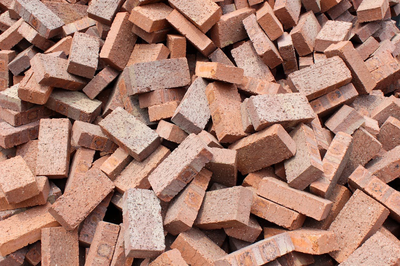 brand-03 A large pile of red bricks suitable for construction and building projects in Indonesia.