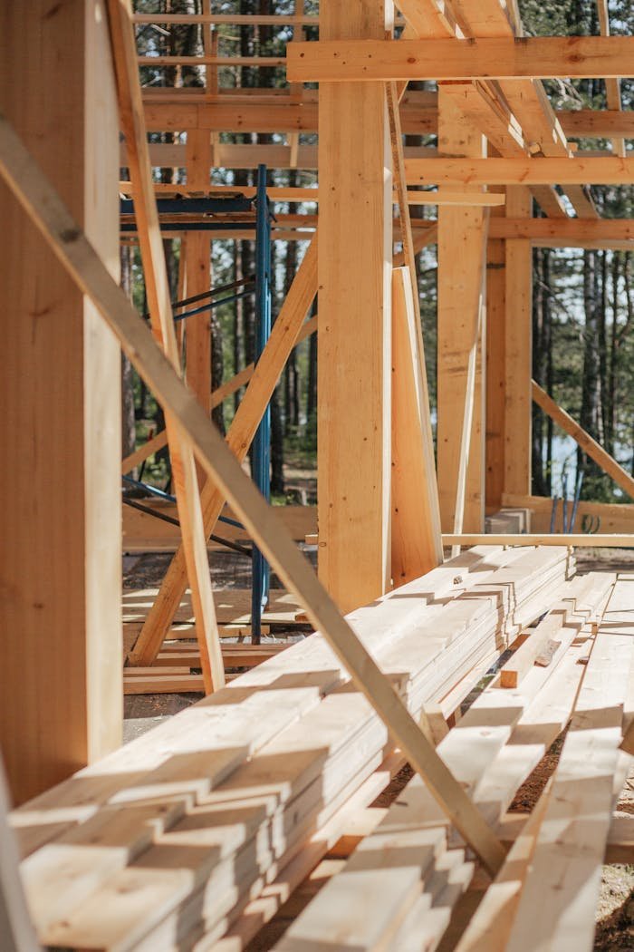 creative Sunlit construction site with wooden lumber arranged in rows. Perfect for building projects.