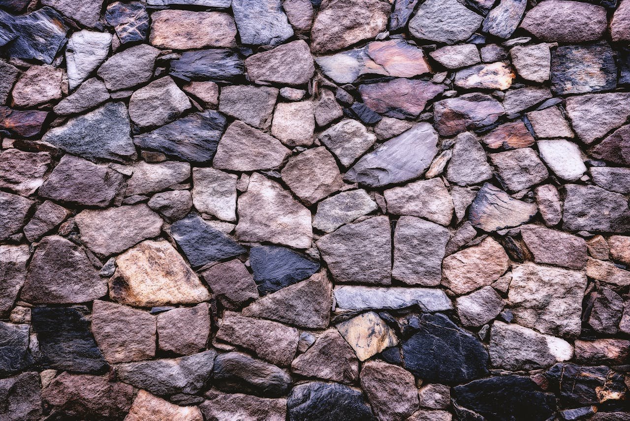digital-01 High-resolution image of a rustic stone wall showing detailed texture and pattern.